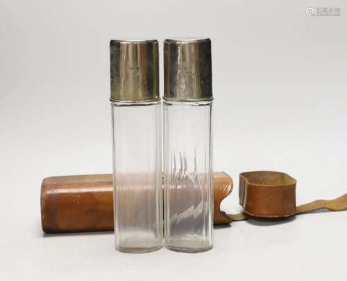 A late 19th/early 20th century leather duo travelling flask ...