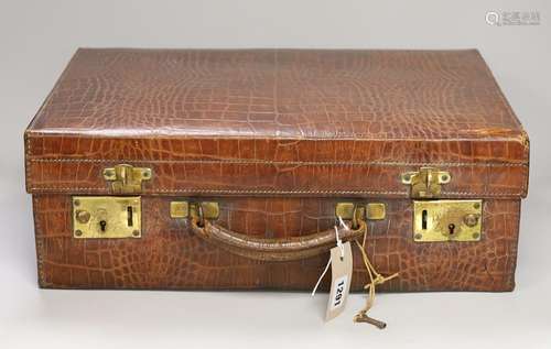 A George V crocodile skin toilet case