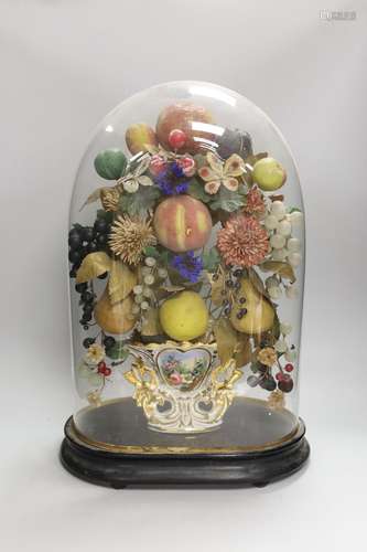 A Victorian painted mache fruit arrangement under a glass do...