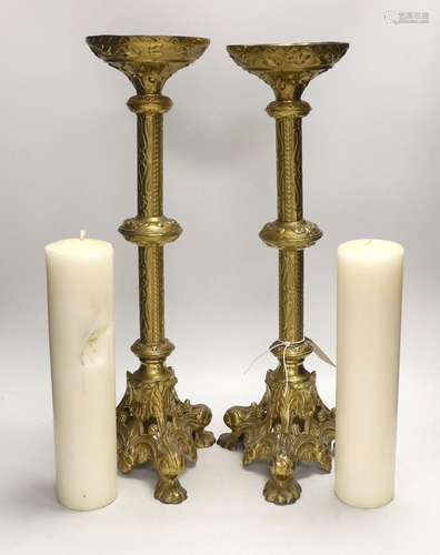 A pair of tall Victorian ecclesiastical brass candlestands, ...