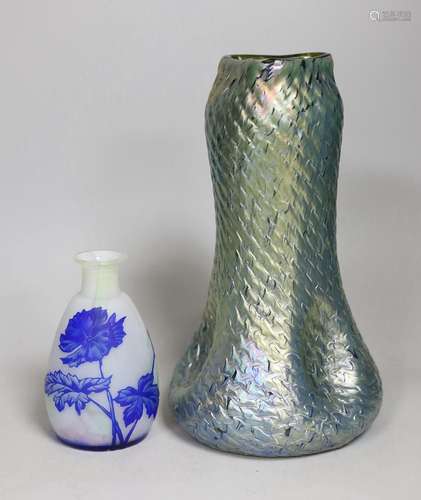 A Harrach cameo glass vase and an iridescent art glass vase....