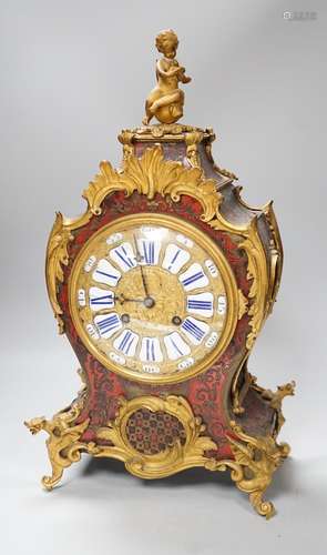 A French scarlet Boulle work and ormolu mounted mantel clock...