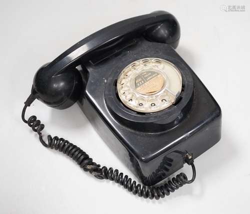 A black Bakelite telephone