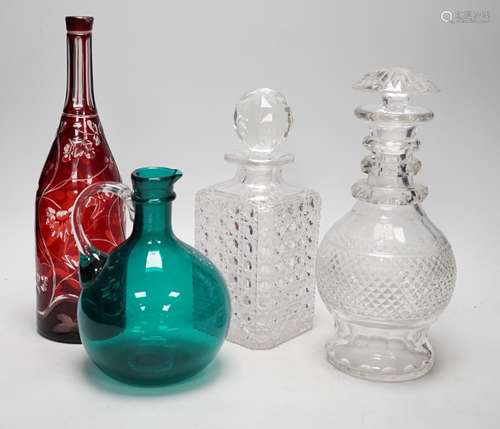 A green glass decanter flagon, a Bohemian red flash cut cara...