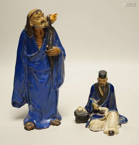 Two Chinese glazed pottery figures of Li Tieguai and Lu Dong...