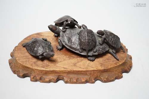 A Japanese Meiji period bronze turtle group, signed to base,...