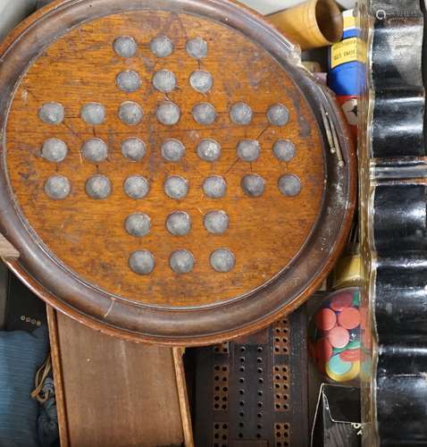 A selection of various games, to include a cribbage board, c...