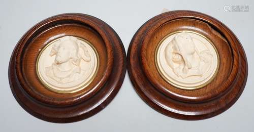 A pair of late 19th century carved and moulded composition p...