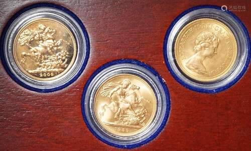 QE II coins, a triple gold sovereign set; 1959, 1974 & 2...