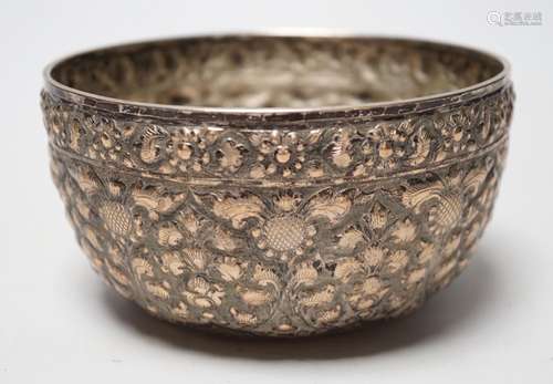 A Chinese Straits? embossed white metal bowl, indistinct mar...