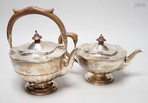 A George V silver tea kettle and teapot by Walker & Hall...