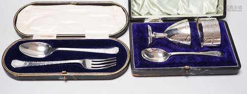 A cased George V silver christening trio, by Walker & Ha...