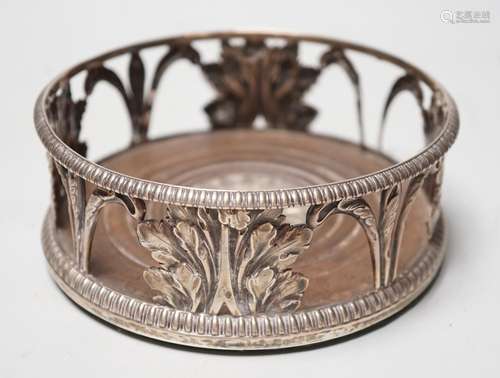 An early 19th century silver mounted wine coaster, marks rub...