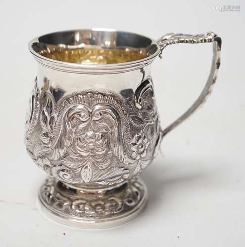 A George IV embossed silver baluster christening cup, London...