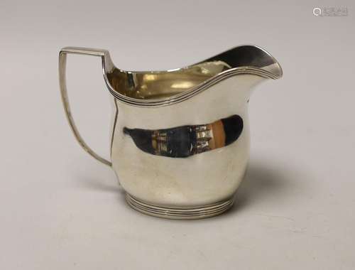 A George III silver helmet shaped cream jug, London, 1810, 1...