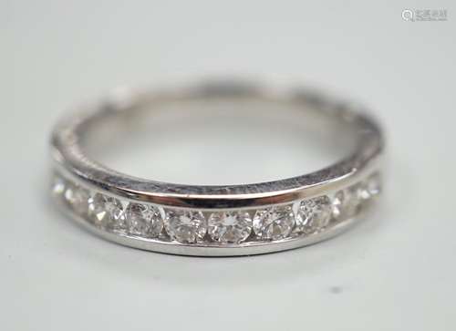 A modern 18k white metal and ten stone channel set diamond h...