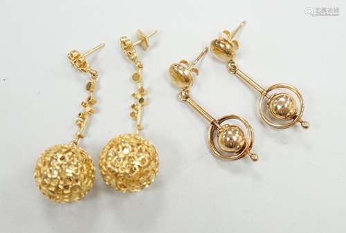 A modern pair of pierced 9ct gold globe drop earrings, 47mm ...