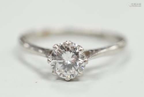 A white metal (stamped plat) and solitaire diamond ring, siz...