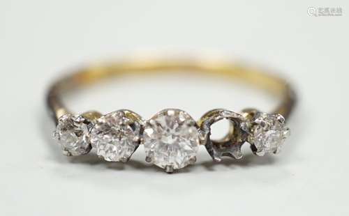 An 18ct and graduated five stone diamond set half hoop ring,...