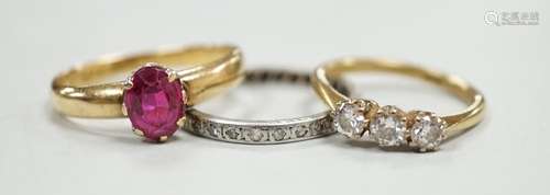 An 18ct and solitaire synthetic? ruby set ring, an 18ct and ...