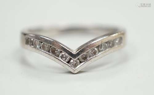 A modern 18ct white gold and channel set diamond chip wishbo...