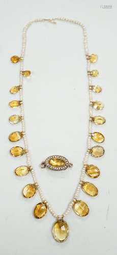 An Edwardian twenty one graduated oval cut citrine set seed ...