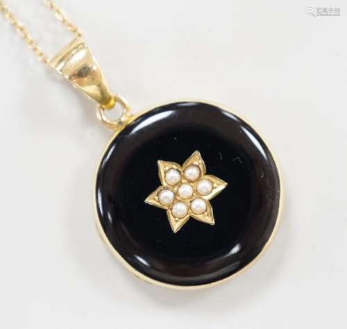 A late Victorian 15ct, black enamel and seed pearl set circu...