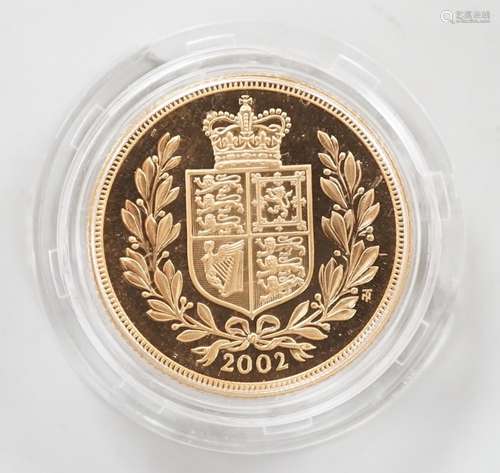 An Elizabeth II 2002 gold sovereign, in case.