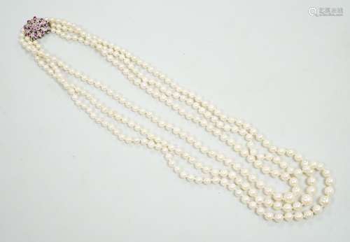 A 1960s triple strand graduated cultured pearl necklace, wit...