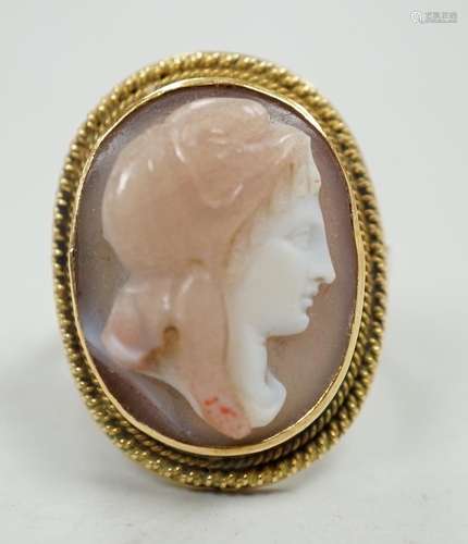 A modern 9ct gold and hardstone cameo ring, carved with the ...