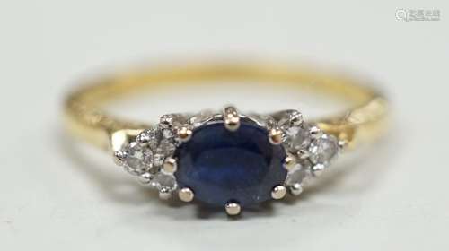 A modern 18ct gold, single stone sapphire and six stone diam...