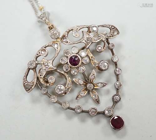 A yellow and white metal, ruby and diamond cluster set drop ...