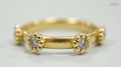 A modern 18ct gold and four stone diamond set ring, size K, ...