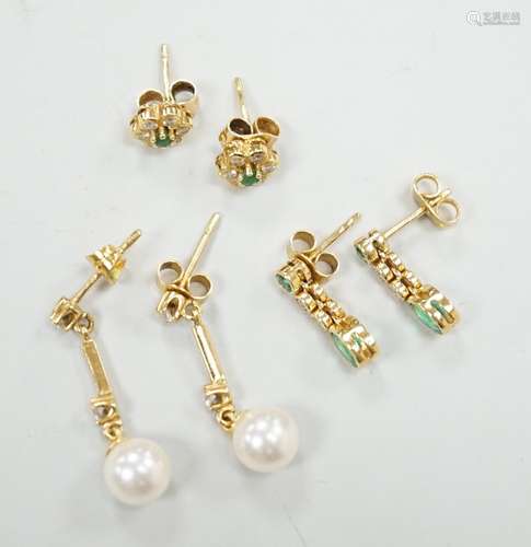 Two modern pairs of 18ct gold, emerald and diamond set ear s...