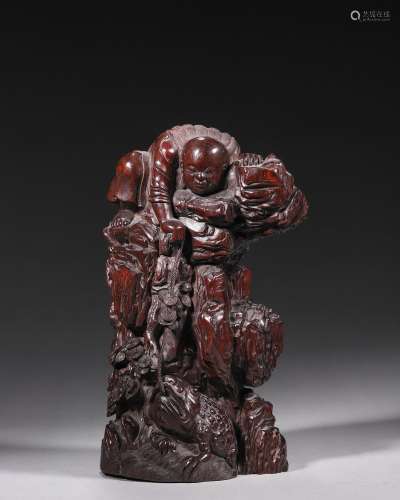 A red sandalwood figure ornament
