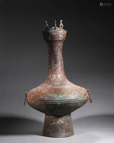 A gem-inlaid bronze pot