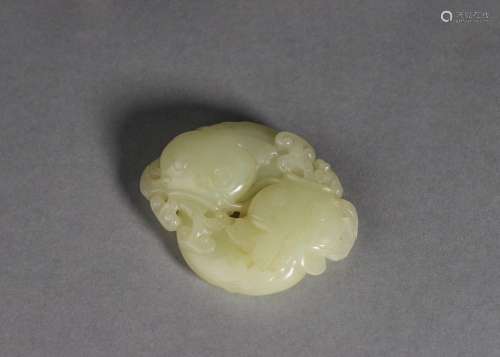A fish patterned jade pendant