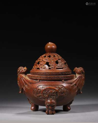 A dragon carved bamboo incense burner with bat shaped ears