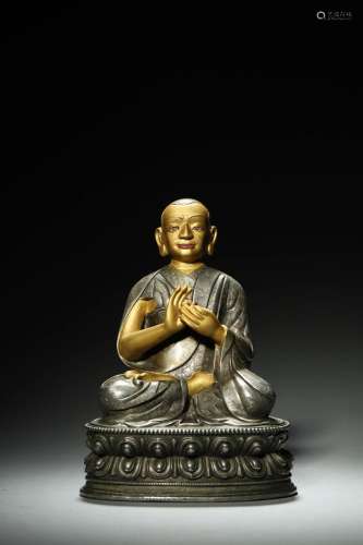 A silver buddha statue