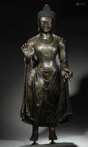 A silver-inlaid alloy copper Sakyamuni buddha statue