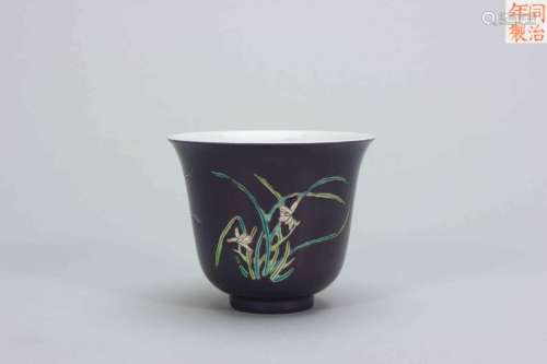 A purple ground famille rose orchid porcelain cup