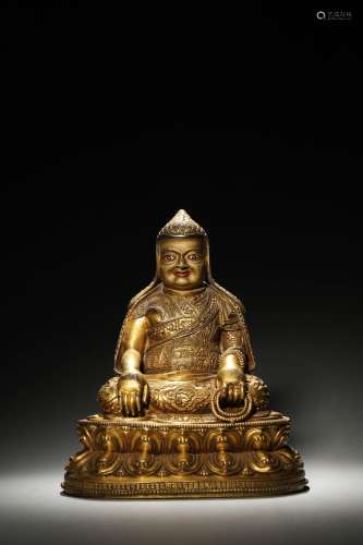 A gilding copper carved buddha statue