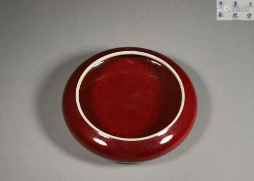 A red glaze porcelain water pot