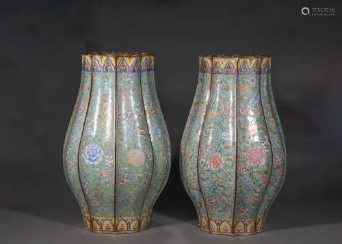 A pair of flower patterned copper enamel vases