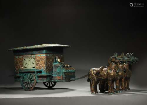 A jade-inlaid bronze wagon