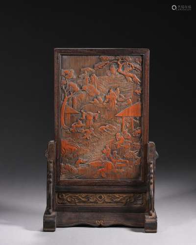 A figure carved bamboo screen