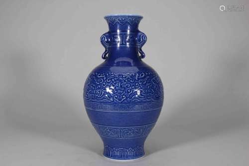 A blue glaze dragon porcelain vase with elephant head shaped...