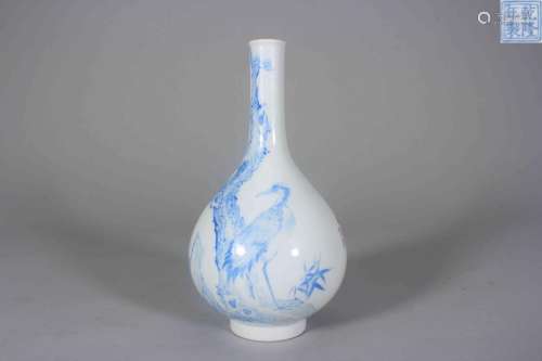 An enamel bamboo, pine and crane porcelain vase