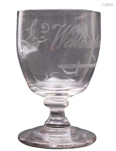 A small toasting glass, the oviform bowl engraved with a swo...