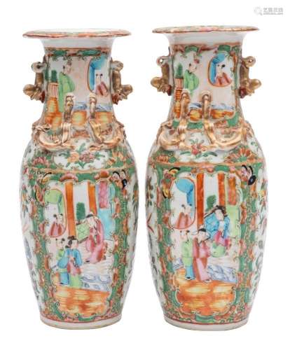A pair of Canton baluster vases with applied gilt lion dog h...
